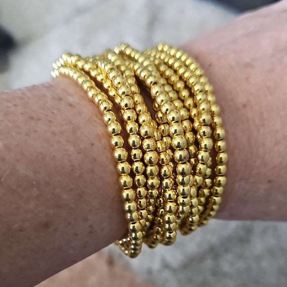 Elegant Gold Beaded Bracelet Set Of 12. - Picture 1 of 2